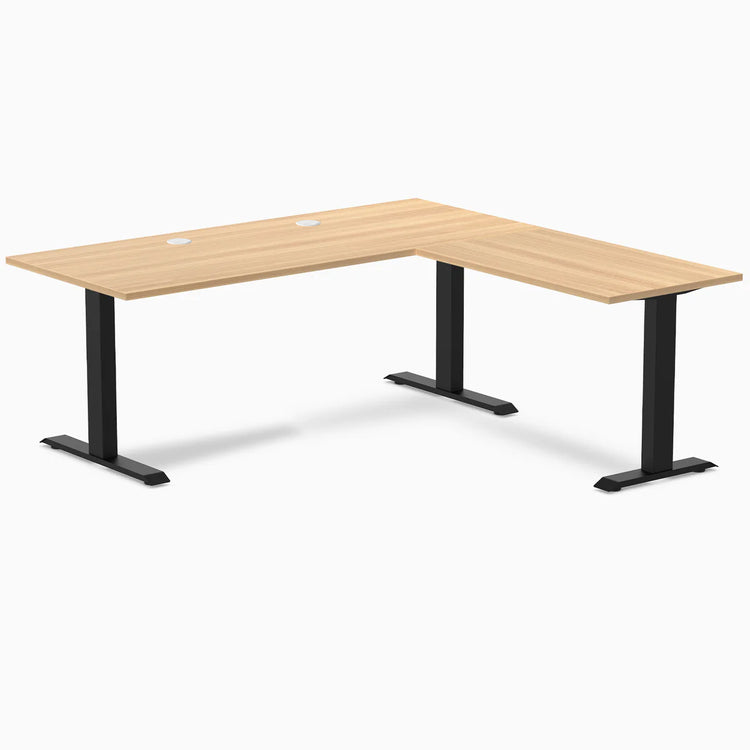 Sublime Teak L-shape office desk with matte black steel frame and grommets.