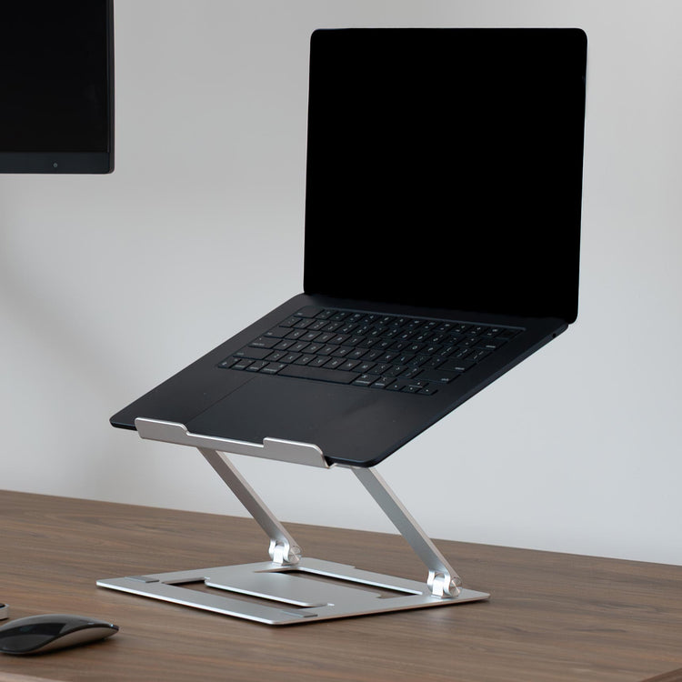 Adjustable laptop stand riser