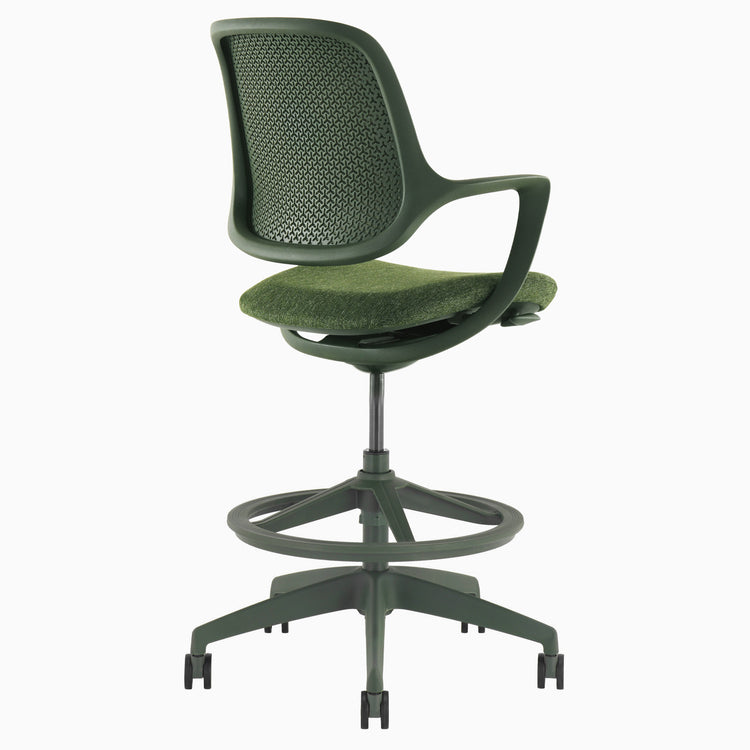Dark green low bac office chair with drafting kit