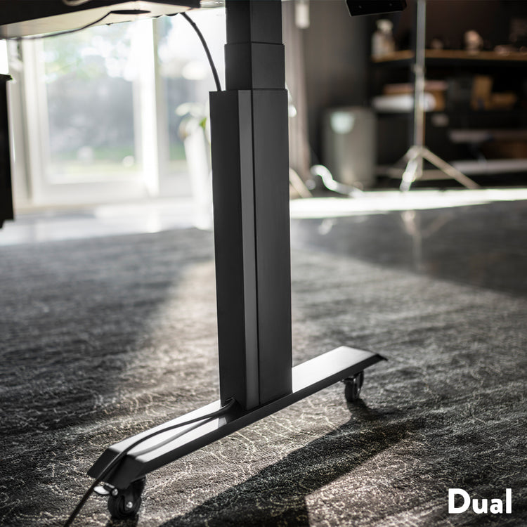 Desky dual magnetic cable management in black attached on desk leg