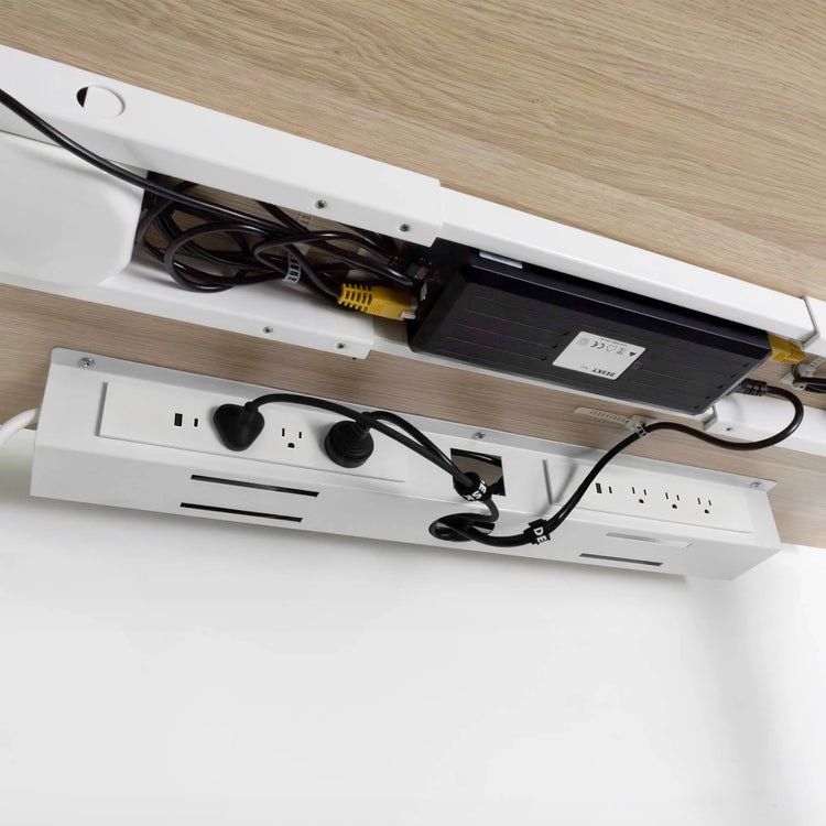 White mini cable and management tray under standing desk