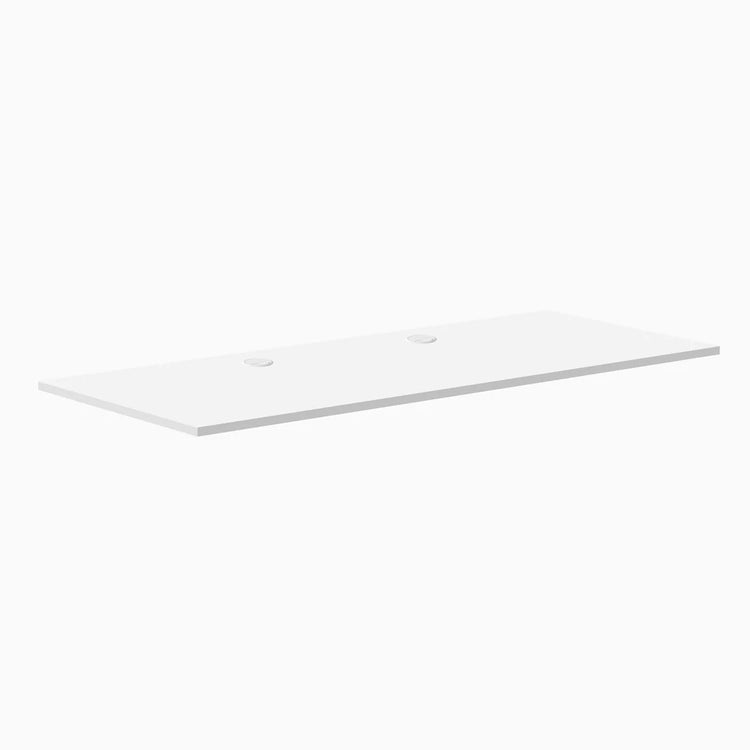 Desky 70.9x29.5 inch white laminate desktop with two grommets for cable management.