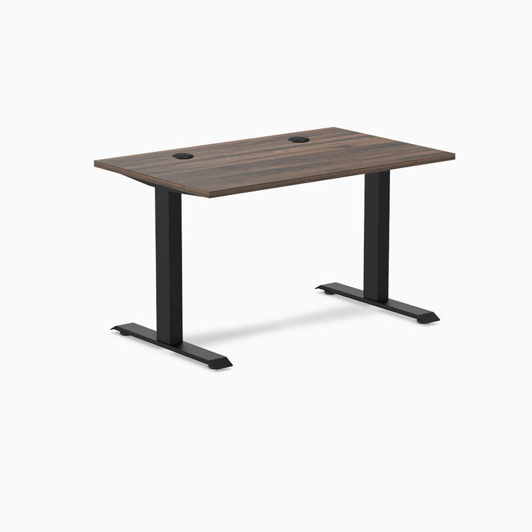 Desky Zero fixed height office desk with Jarrah Legno laminate top, black steel frame, and grommets.