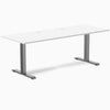 Desky Zero fixed height office desk with white laminate top, space gray steel frame, and two grommets.