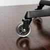 Desky office chair caster wheels in clear on hardwood floor