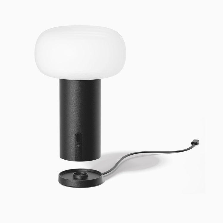Black cordless rechargeable desk lamp with charging dock