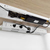 White mini cable and management tray under standing desk