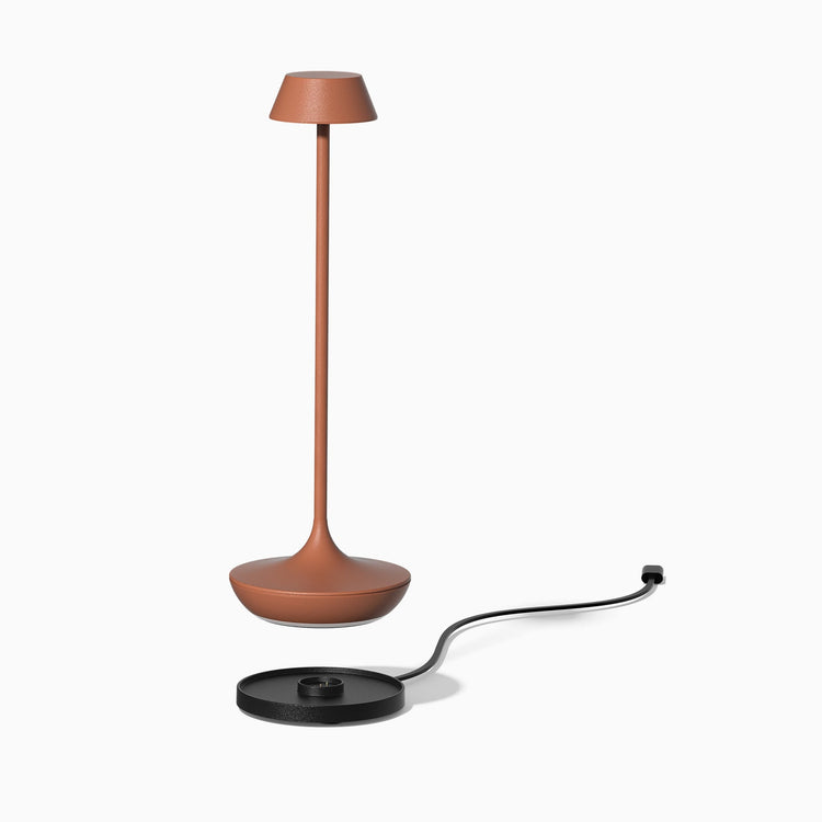 Desky nimbus rechargeable desk lamp with charging dock in terracotta