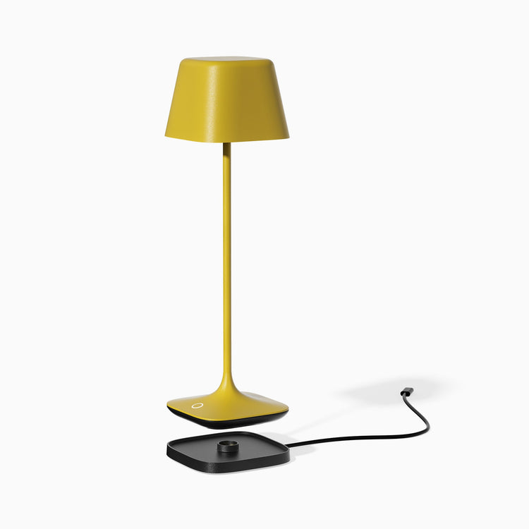 Desky cube cordless lamp in yellow with charger dock