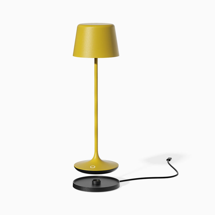 Desky cordless silhouette desk lamp with magnetic charging dock in yellow