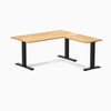 Desky Zero L-Shape Office Desk with White Oak hardwood top and matte black steel frame.